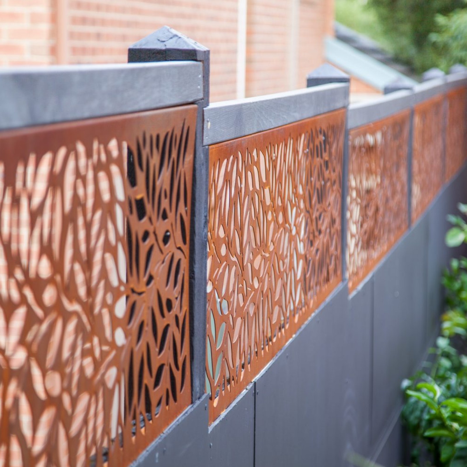 Beautiful corten fence topping used in Kew garden design