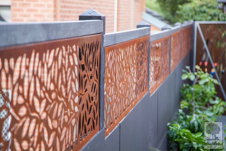 Beautiful corten fence topping used in Kew garden design