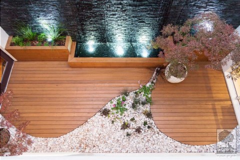 View of courtyard with wall to wall water feature from the upstairs bedrooms