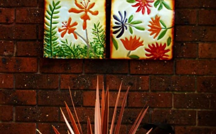 Close up of metal artwork used in tropical garden design in Vermont South