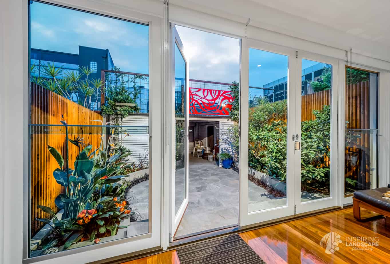 View from internal living spaces of Hawthorn East courtyard garden design by Parveen Dhaliwal