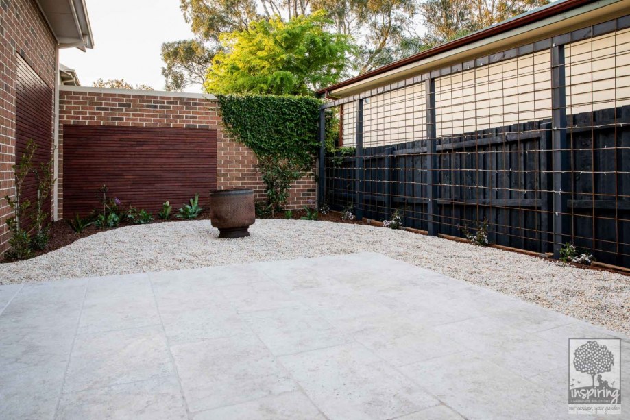 Travertine paving in outdoor area in Surrey Hills landscape design