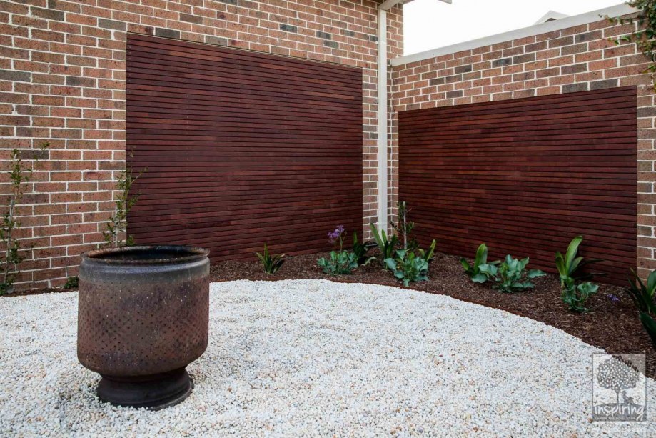 Travertine paving in outdoor room in Surrey Hills landscape design by Parveen Dhaliwal