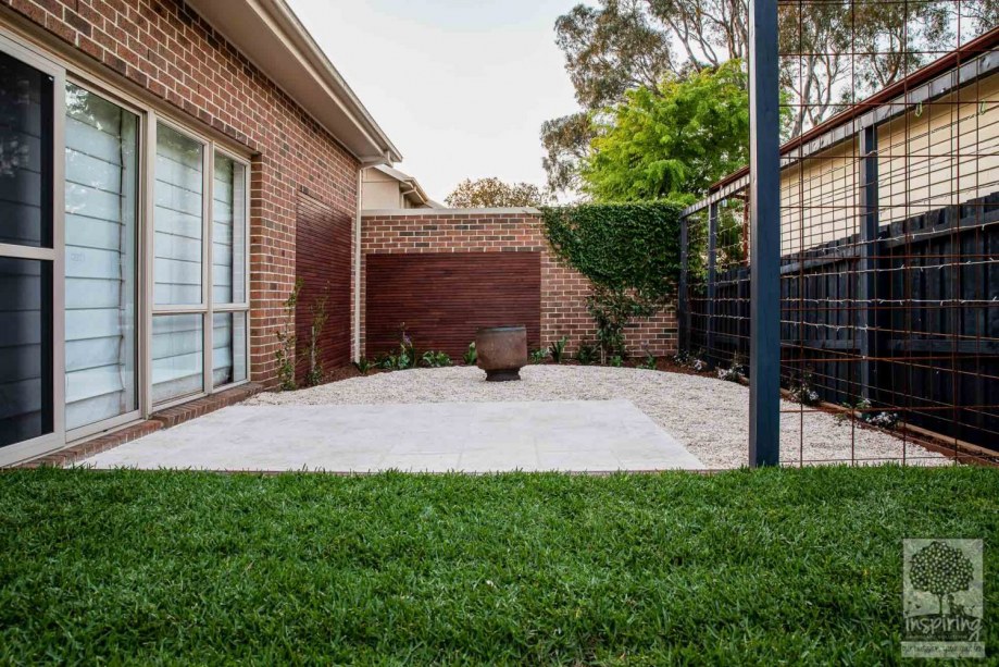 Travertine paving in outdoor room in Surrey Hills landscape design