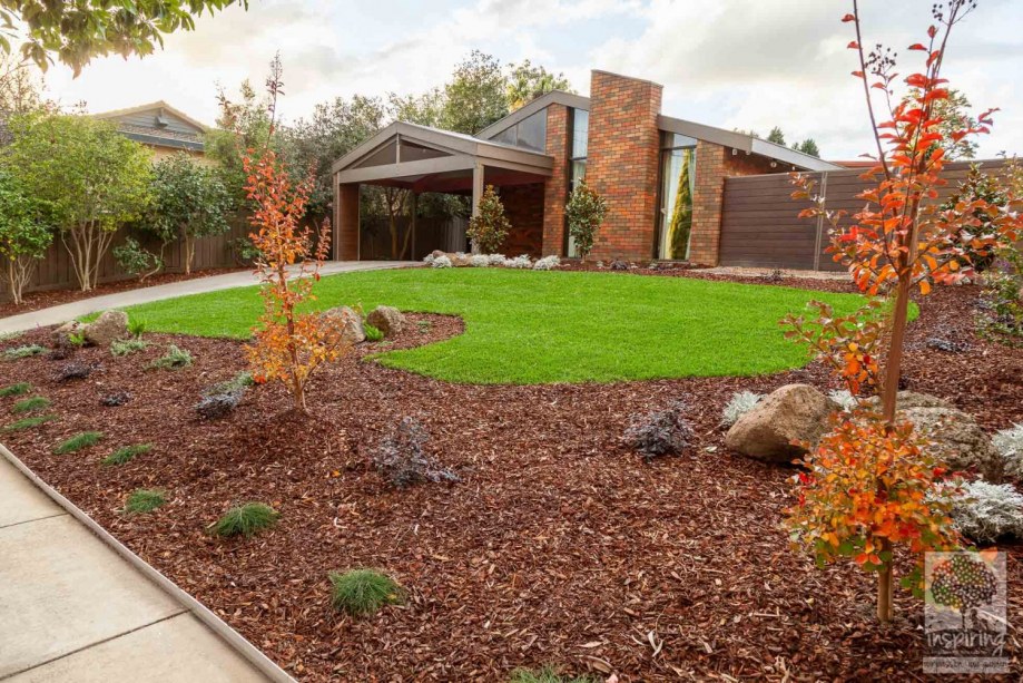 Side view of Vermont South garden design with autumn colours on the small trees