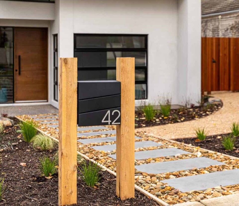 View of front entry stepper path from the street in Burwood landscape design by Parveen Dhaliwa