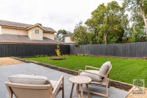 View of garden from outdoor patio seating in Burwood landscape design by Inspiring Landscape Solutions