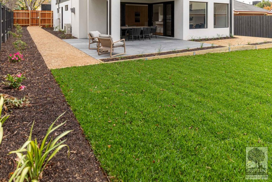 Closeup of backyard grassed area in Burwood landscape design by Parveen Dhaliwal