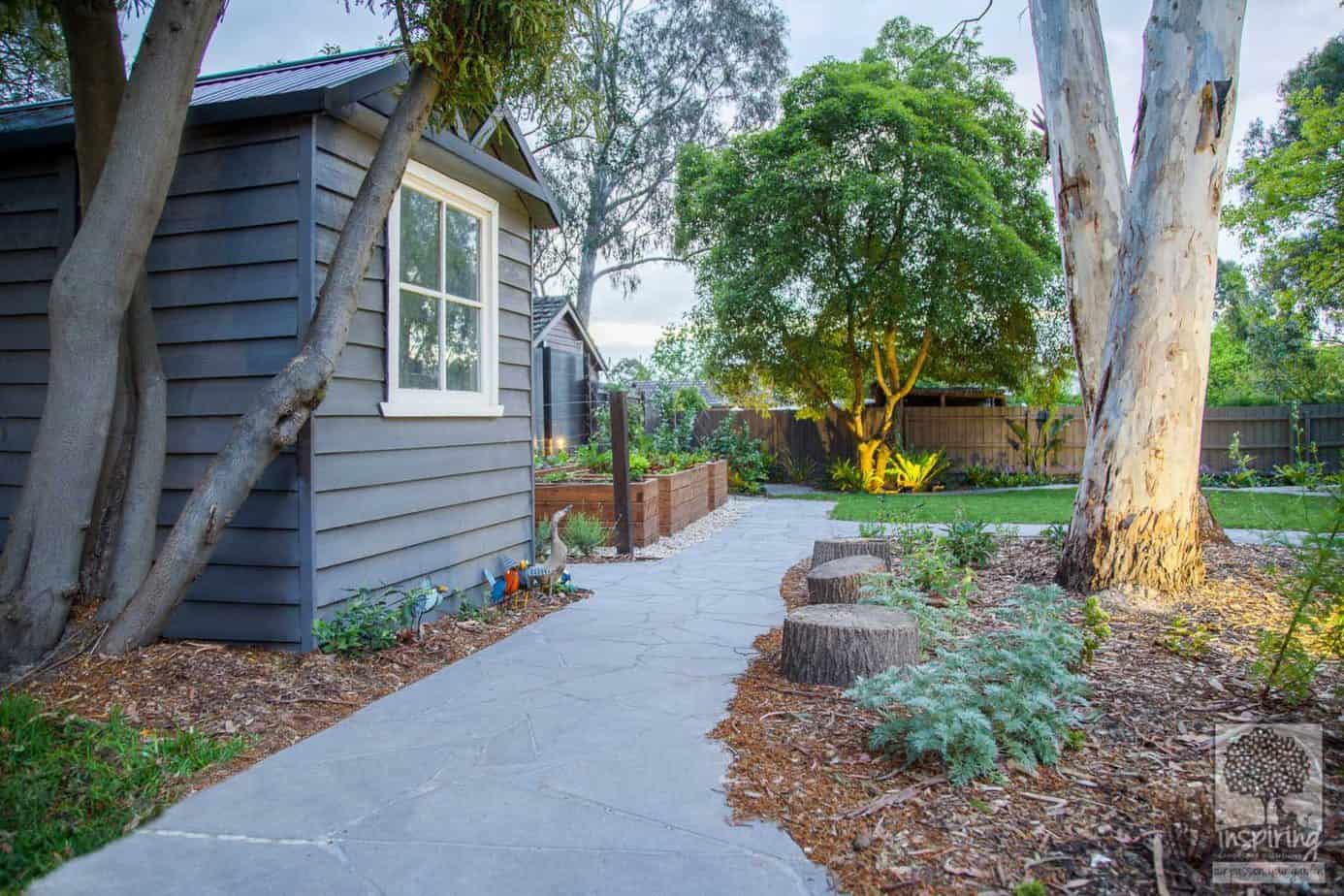 View of kids cubby and main vege patch area in Blackburn landscape design by Parveen Dhaliwal