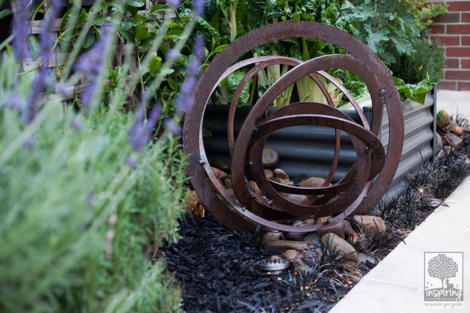 Closeup of garden sculpture used in Bundoora garden design