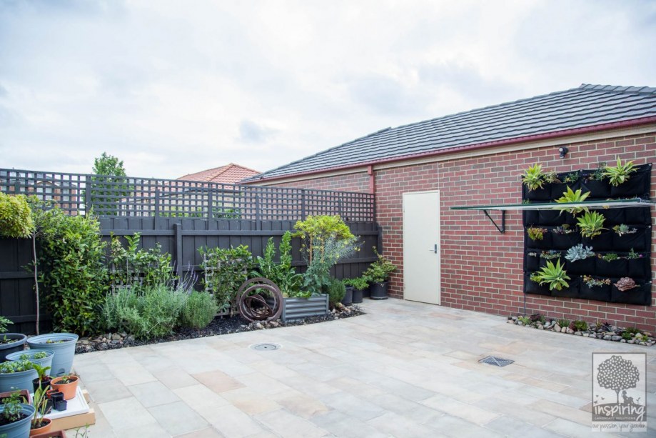 Bundoora garden design with sandstone paving and edible planting by Parveen Dhaliwal