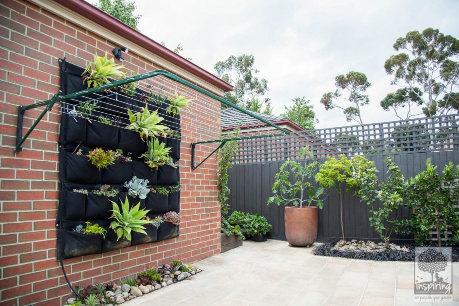 Bundoora garden design with sandstone paving and edible planting