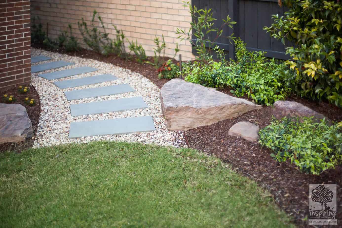 Curved side bluestone path in Glen Waverley front garden design