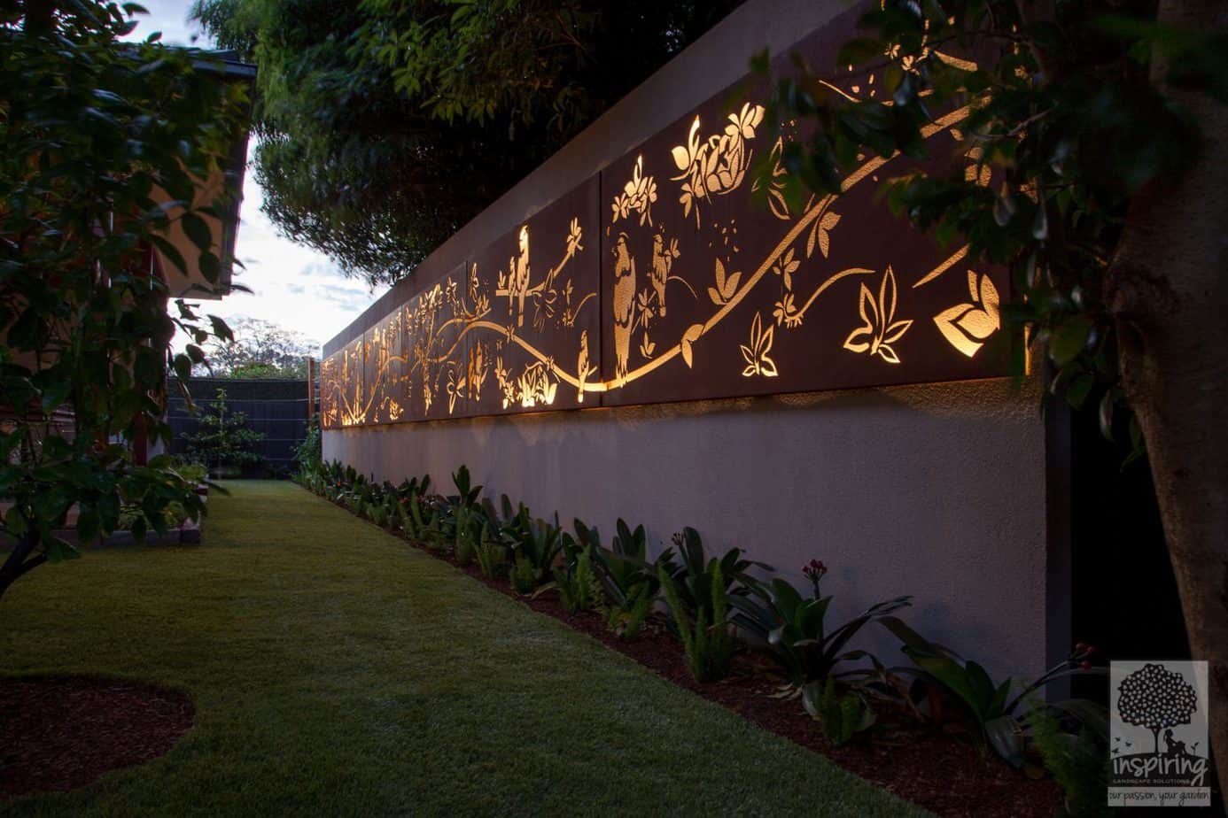 13 meter metal garden feature used in Glen Waverley garden design lit at night