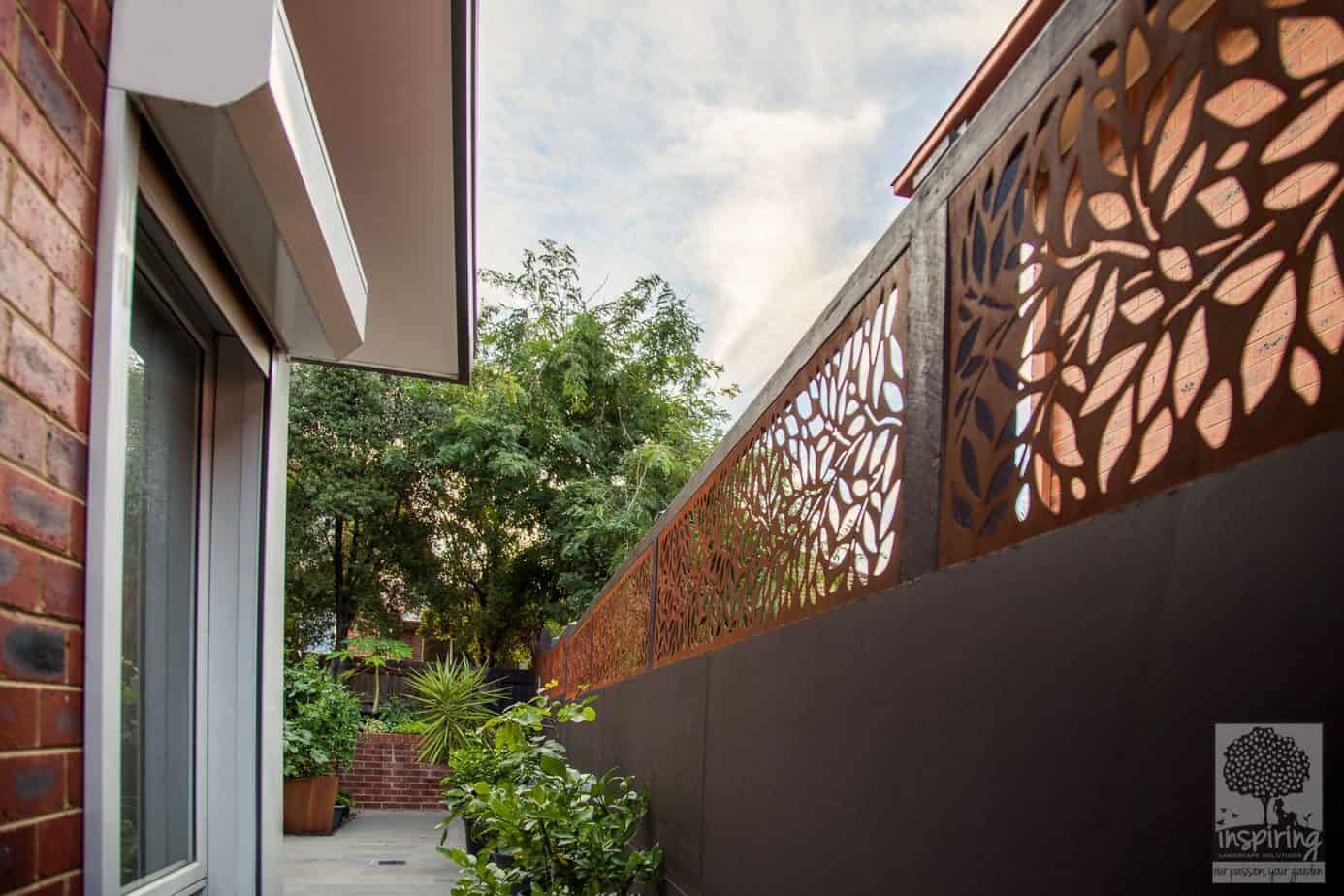 Beautiful corten fence topping used in Kew garden design by Parveen Dhaliwal