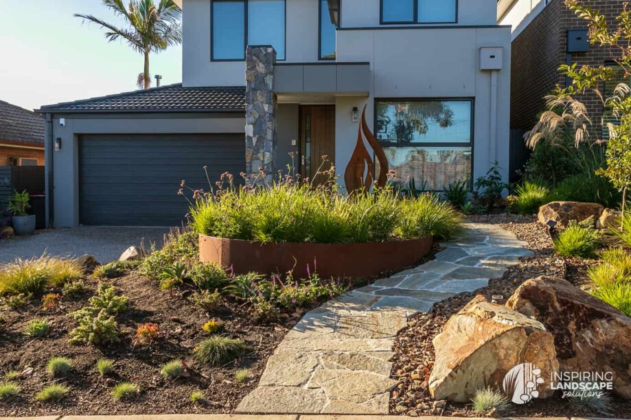 Custom circle corten raised planter in Mount Waverley garden design