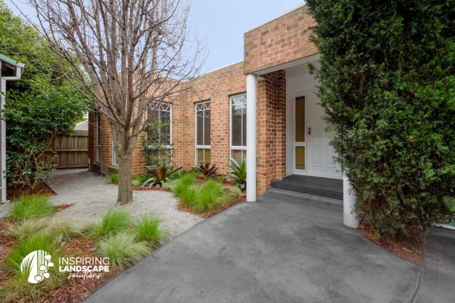 Toppings path and plain concrete driveway in Mulgrave landscape