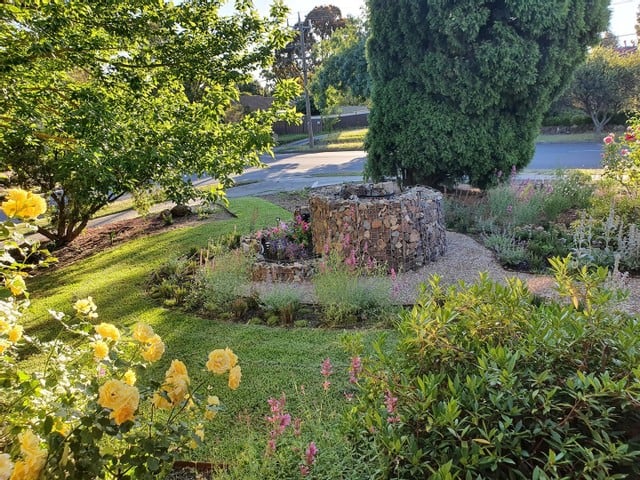 Nautilus shaped gabion wall used in Vermont South front garden