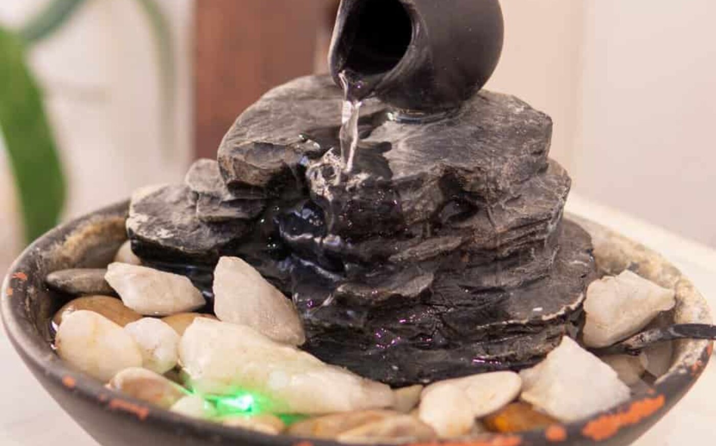 Use a table top fountain to make your own water oasis