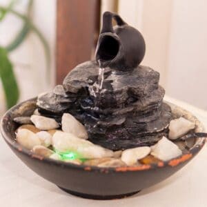 Use a table top fountain to make your own water oasis