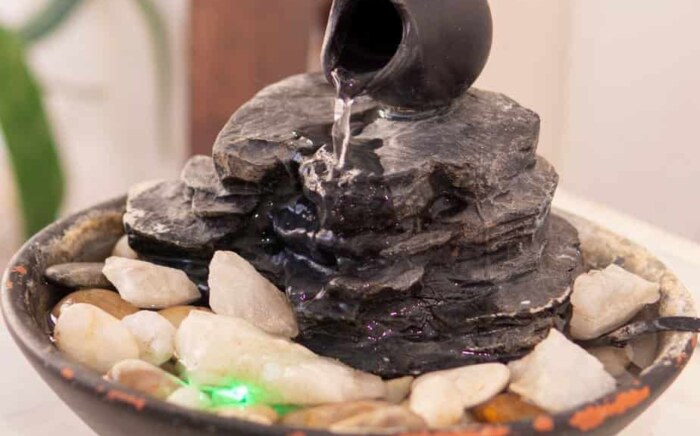 Use a table top fountain to make your own water oasis