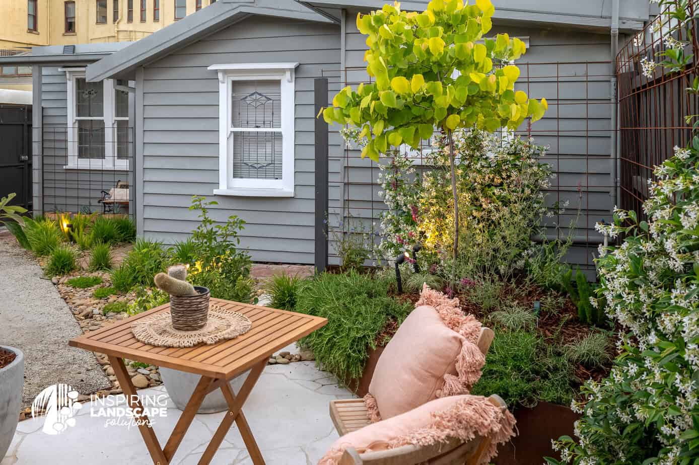 Garden setting in a small, lush courtyard in the backyard of the Brunswick East garden design