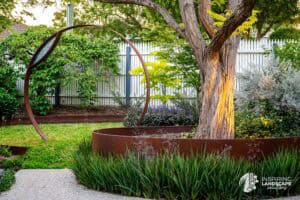 Nunawading Closeup of the arbour and Gleditsia tree as the main centrepieces of the front garden in the Nunawading project